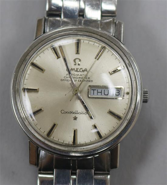 A gentlemans stainless steel Omega Constellation automatic wrist watch, on steel Omega bracelet.